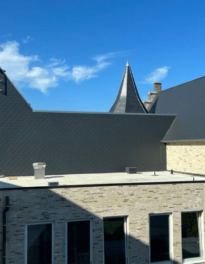Gevelbekleding Gevel in natuursteen bij renovatieproject