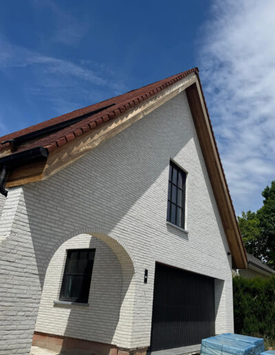 Dakwerken Moderne dakbedekking met leisteen en zink dakkapel renovatie