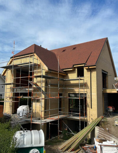 Dakwerken Nieuwbouw dakconstructie en dakpannen installatie