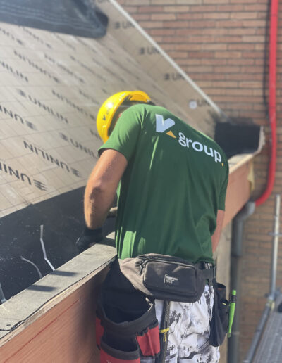 Roofing works Bruges zinc gutter installation detail craftsmanship